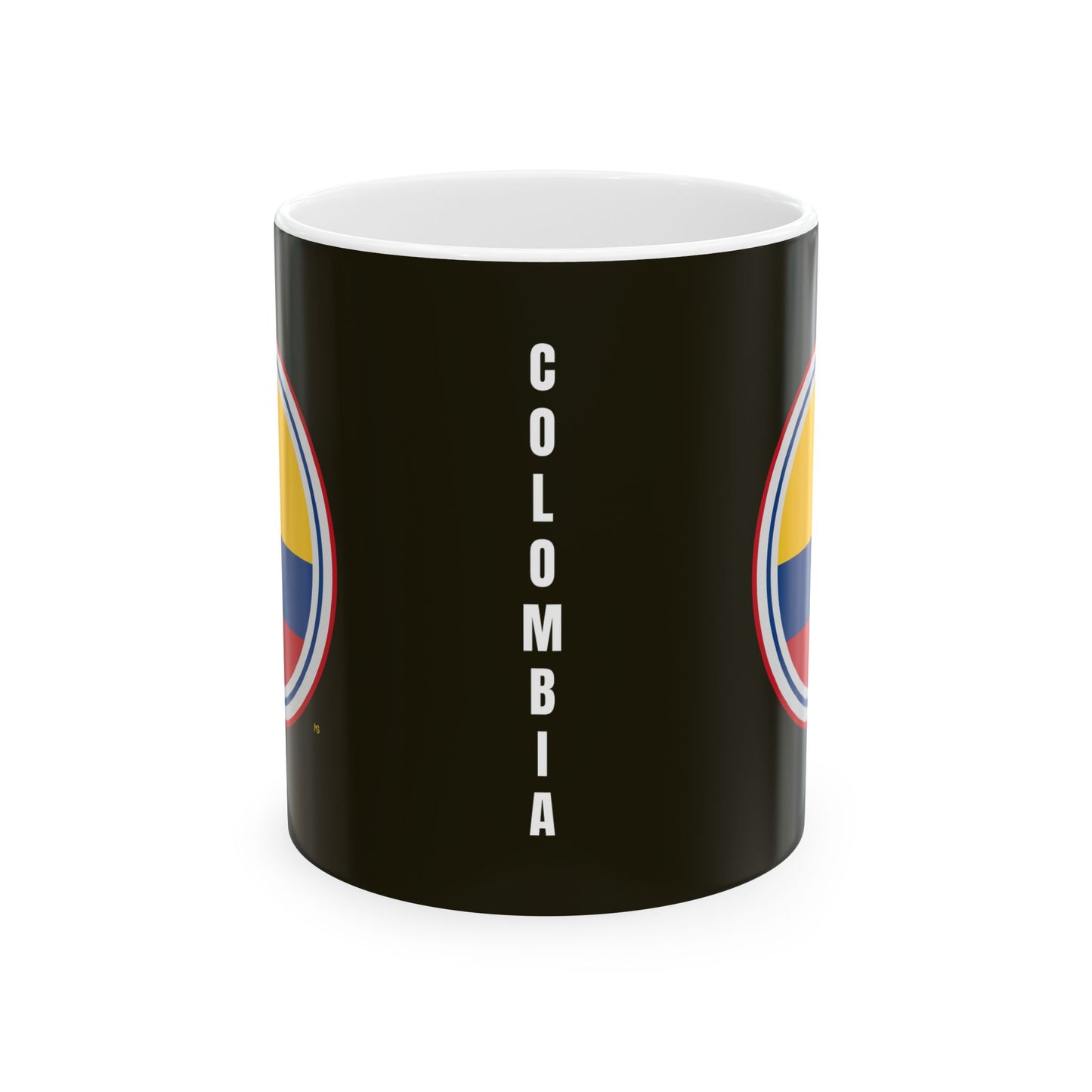 Taza de café negra con la insignia de Colombia